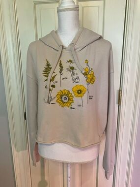 Women's Cream Hoodie Cropped Sweatshirt with Yellow Floral Graphic